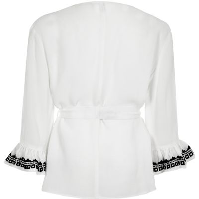 Girls white frilly cover-up